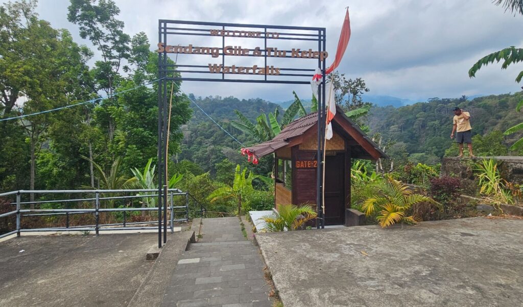Entrance gate to Sendang Gile and Tiu Kelep waterfall in Senaru, Lombok, surrounded by jungle