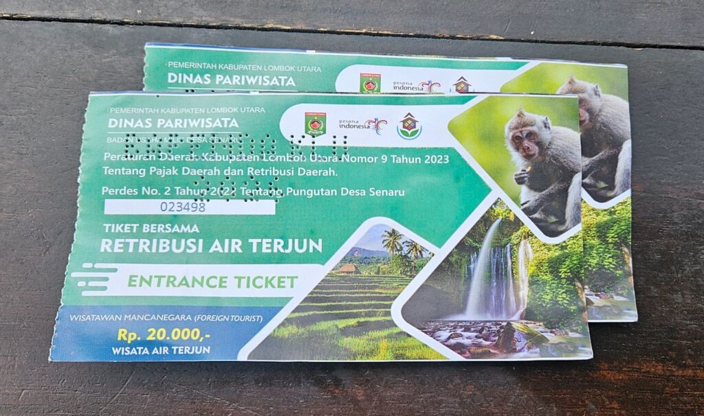 Two entrance tickets for Sendang Gile and Tiu Kelep waterfall, priced at IDR 20,000 each